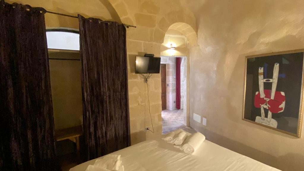 Postel nebo postele na pokoji v ubytování Maison d'Ax