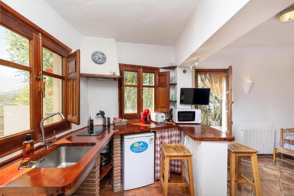 TV a/nebo společenská místnost v ubytování Casa Rural Alba Montis
