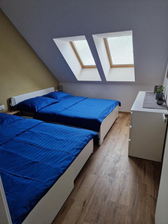 Postel nebo postele na pokoji v ubytování Apartmán Eliška Filipovice