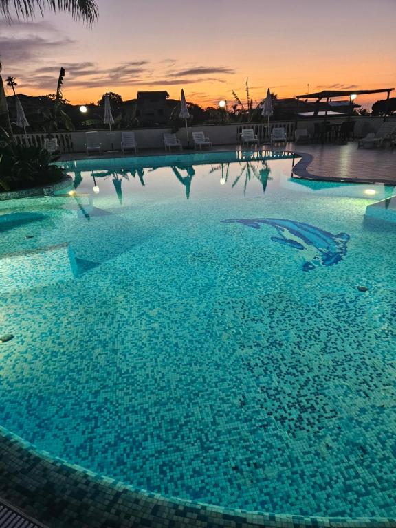 The swimming pool at or close to Graceland rooms and suites