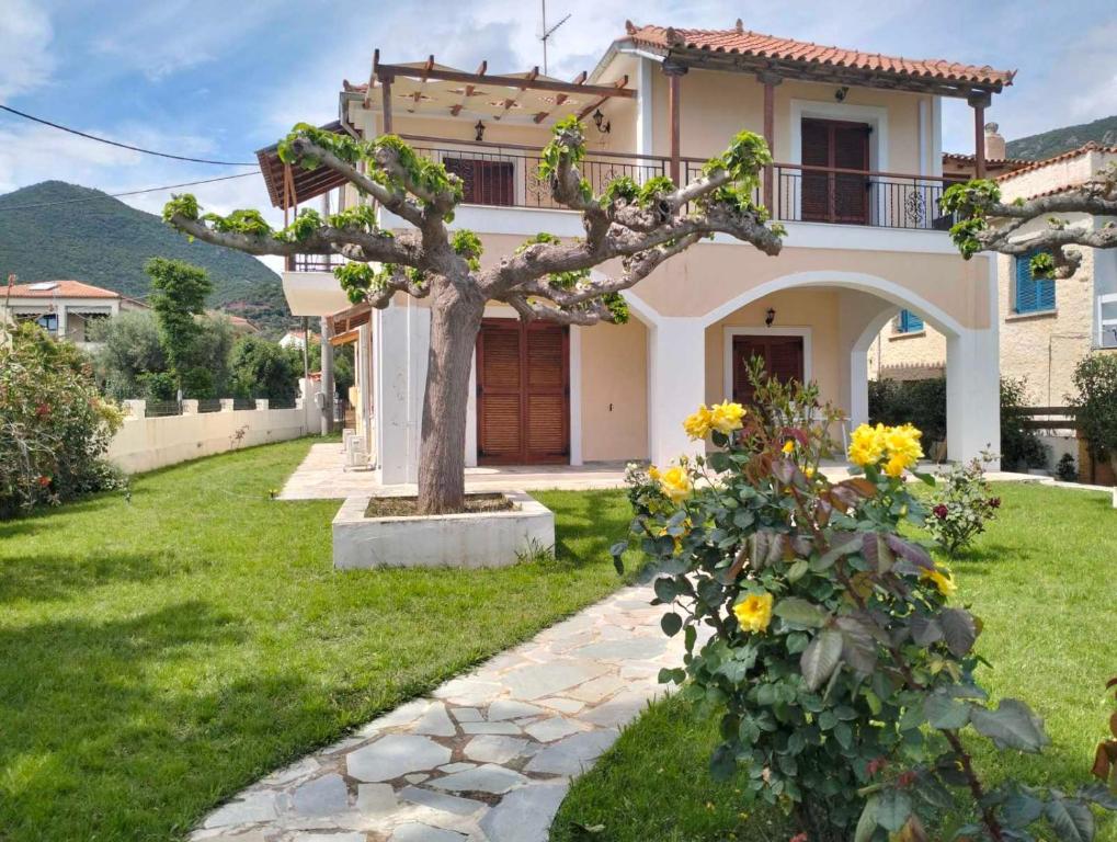 Κήπος έξω από το Tas Millstone Seaside House