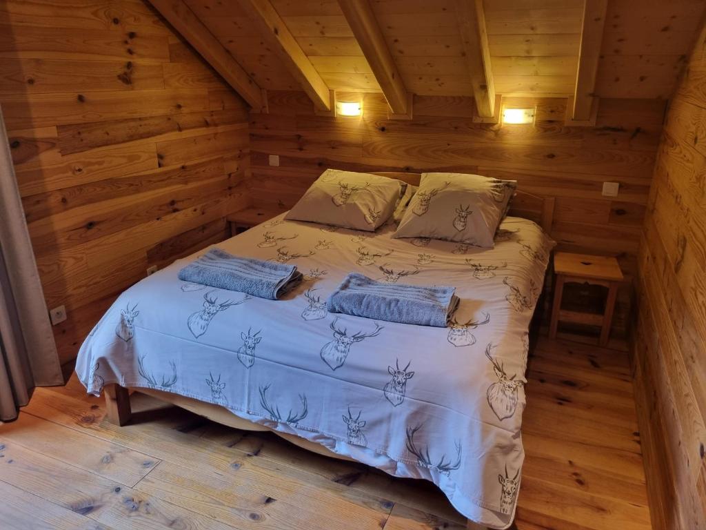 Postel nebo postele na pokoji v ubytování L'Orchidée