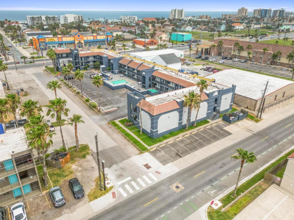 an aerial view of a city with a street at South Padre Island Lodge in South Padre Island