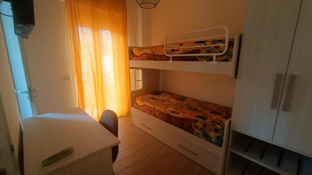 Postel nebo postele na pokoji v ubytování Mar Art Sapri