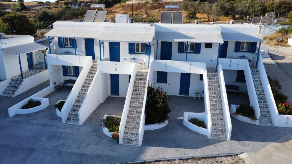 an aerial view of a house with white ladders at ANCHOR in Provatas