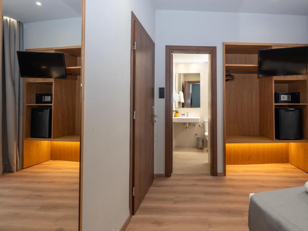 Kuchyň nebo kuchyňský kout v ubytování Athinaiko Hotel