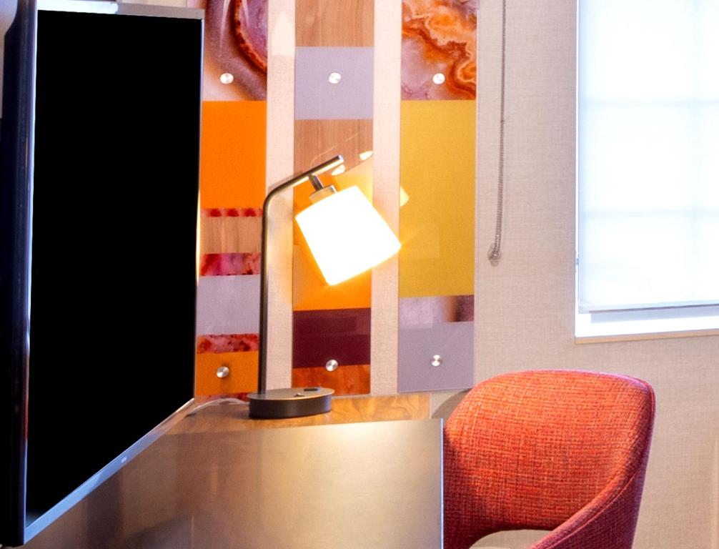 TV a/nebo společenská místnost v ubytování Hampton Inn Pullman