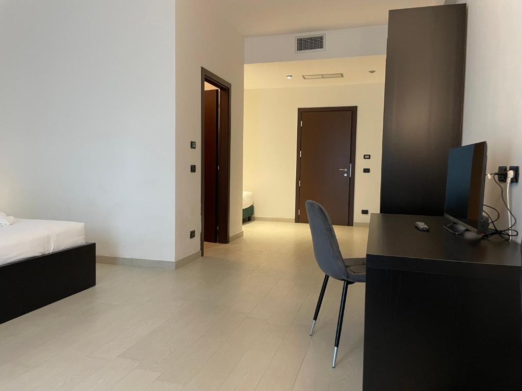 Postel nebo postele na pokoji v ubytování Maestrale Resort Hotel - Grosseto