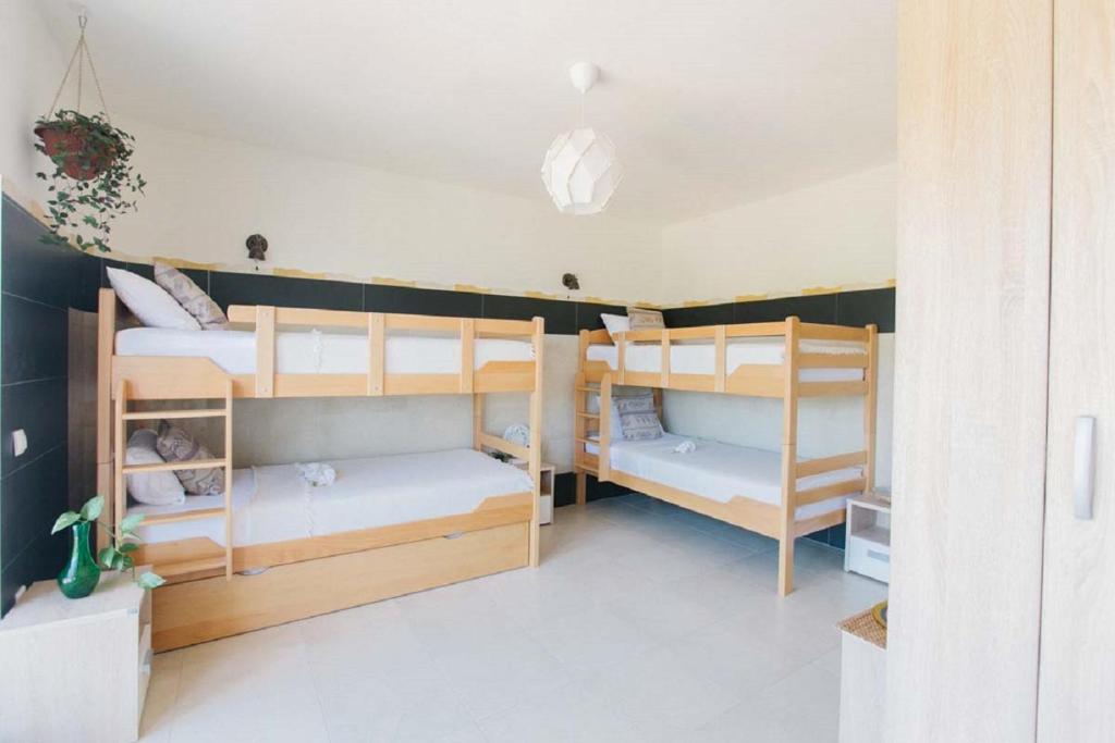 Postel nebo postele na pokoji v ubytování Mahakala Center