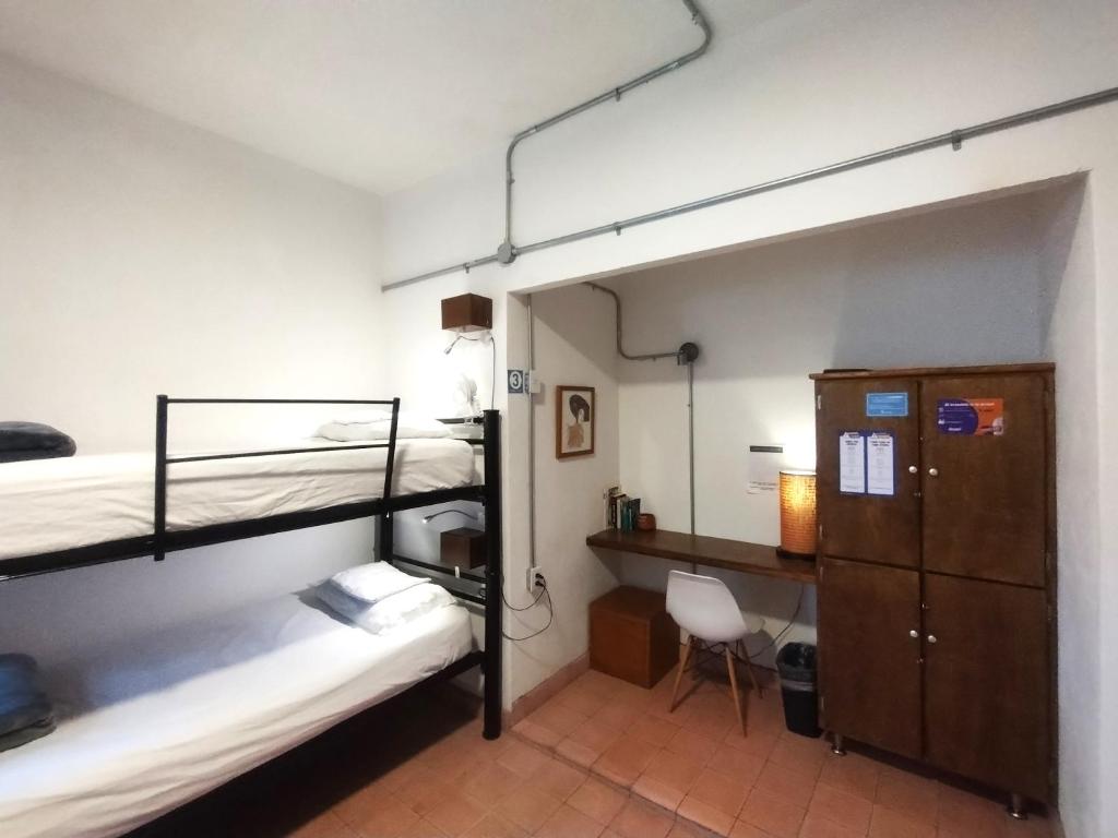Postel nebo postele na pokoji v ubytování Hostel Hospedarte Chapultepec