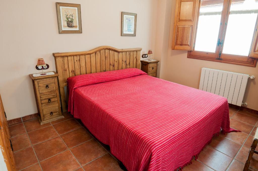 Postel nebo postele na pokoji v ubytování Casa Rural Rosa