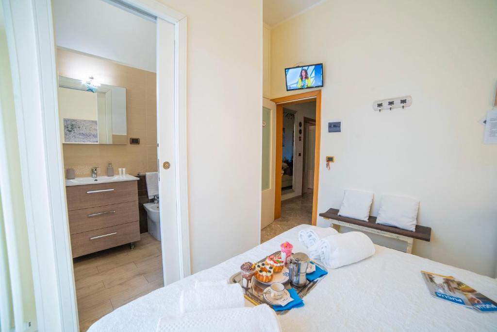 Postel nebo postele na pokoji v ubytování B&B A Due Passi