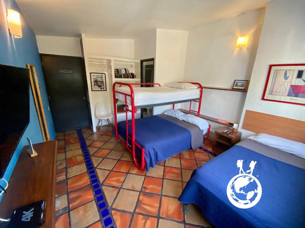 Postel nebo postele na pokoji v ubytování Hostel Hospedarte Chapultepec