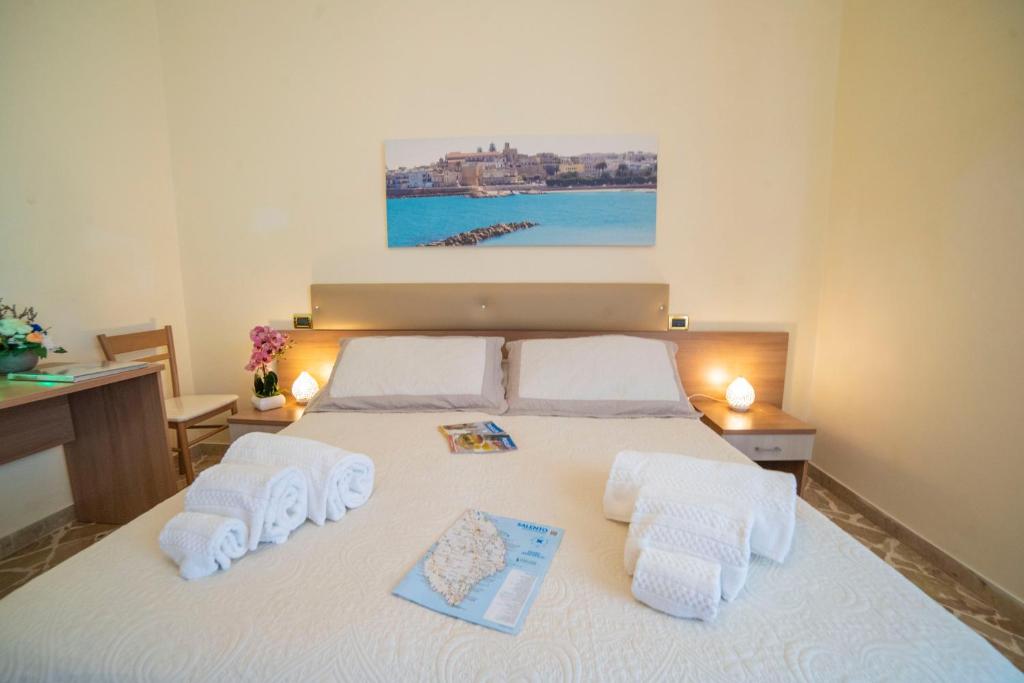Postel nebo postele na pokoji v ubytování B&B A Due Passi