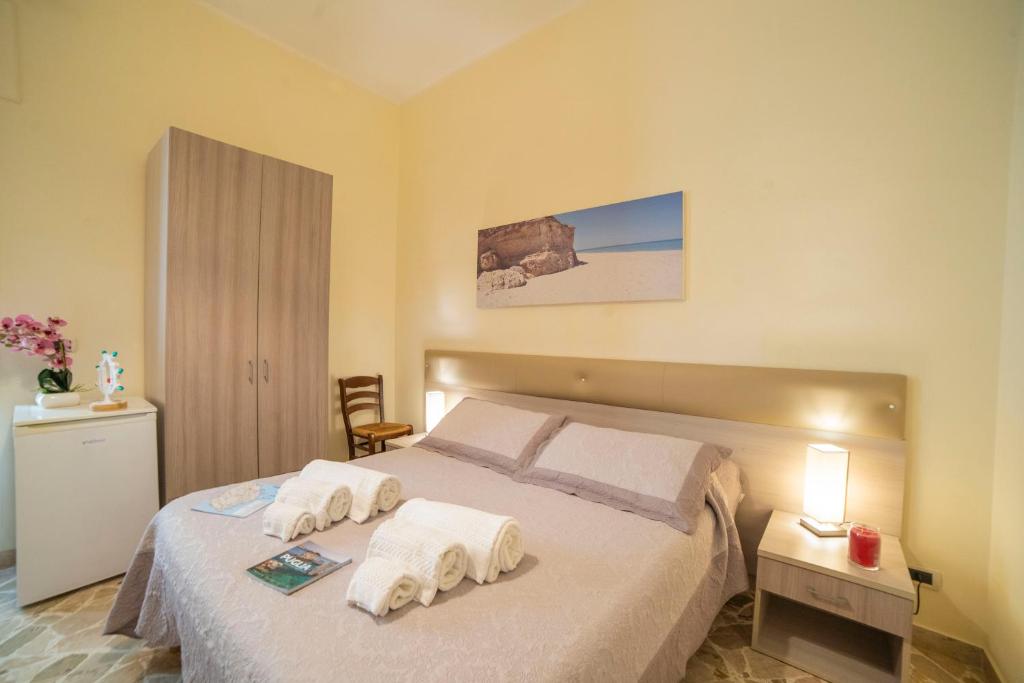 Postel nebo postele na pokoji v ubytování B&B A Due Passi