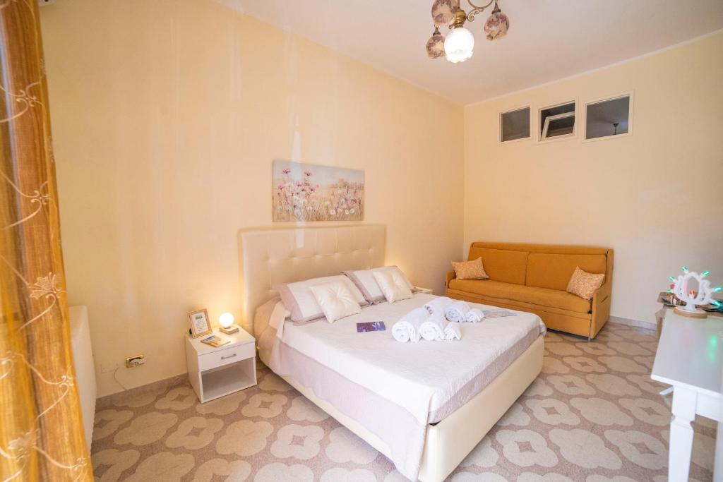 Postel nebo postele na pokoji v ubytování B&B A Due Passi