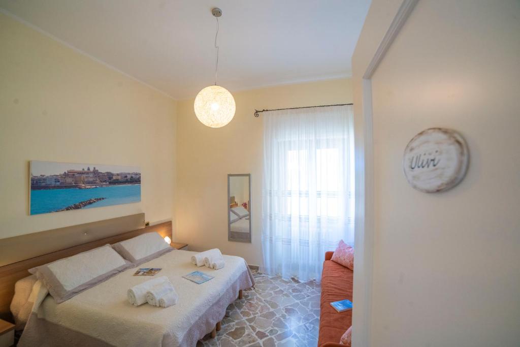 Postel nebo postele na pokoji v ubytování B&B A Due Passi
