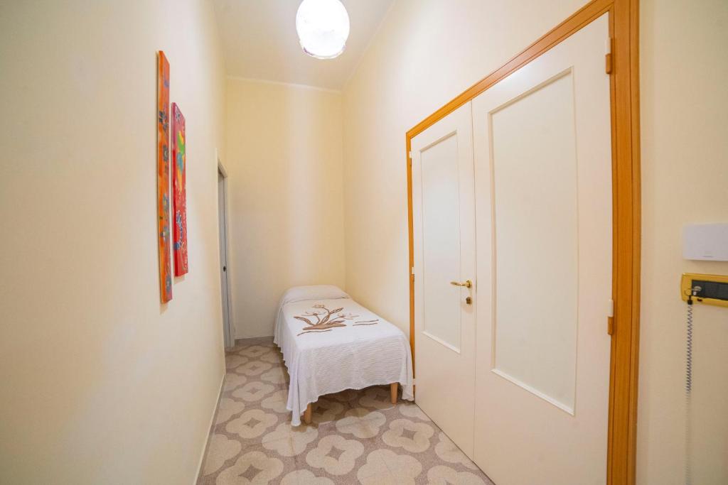 Postel nebo postele na pokoji v ubytování B&B A Due Passi