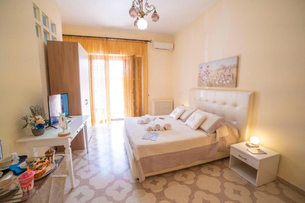 Postel nebo postele na pokoji v ubytování B&B A Due Passi