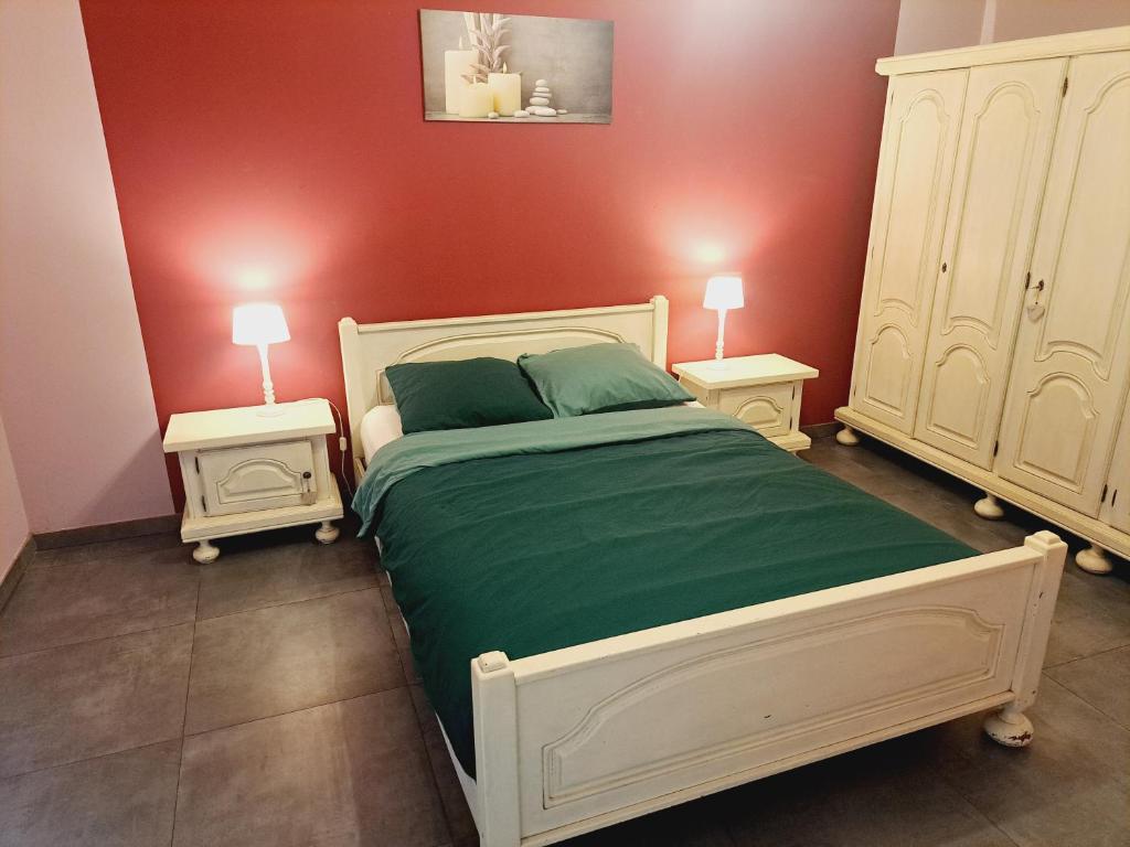 Postel nebo postele na pokoji v ubytování *Au Refuge Ardennais*