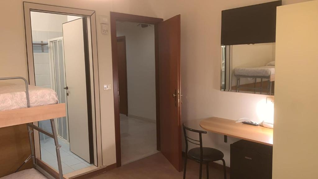 Postel nebo postele na pokoji v ubytování Hotel Rosati
