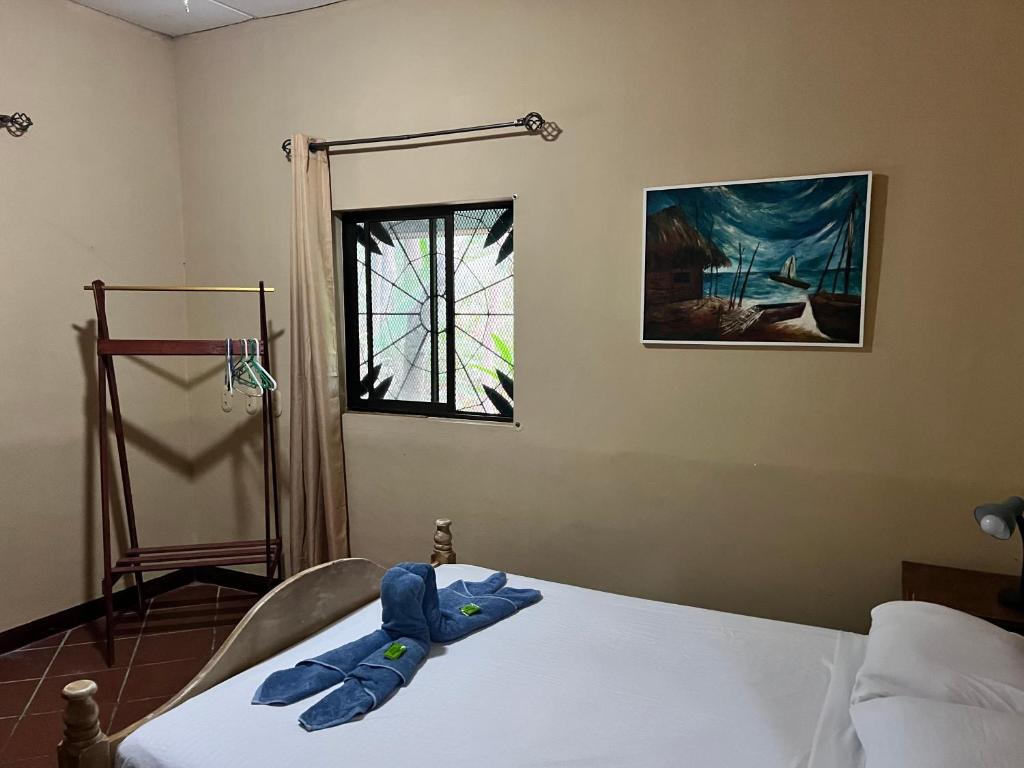 Postel nebo postele na pokoji v ubytování Casa Manglar Villa