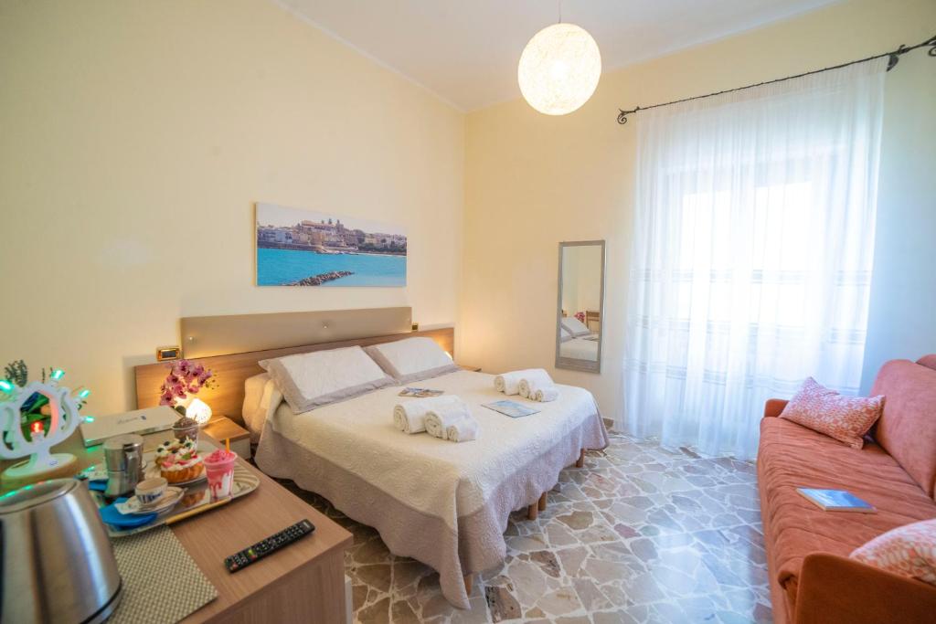 Postel nebo postele na pokoji v ubytování B&B A Due Passi