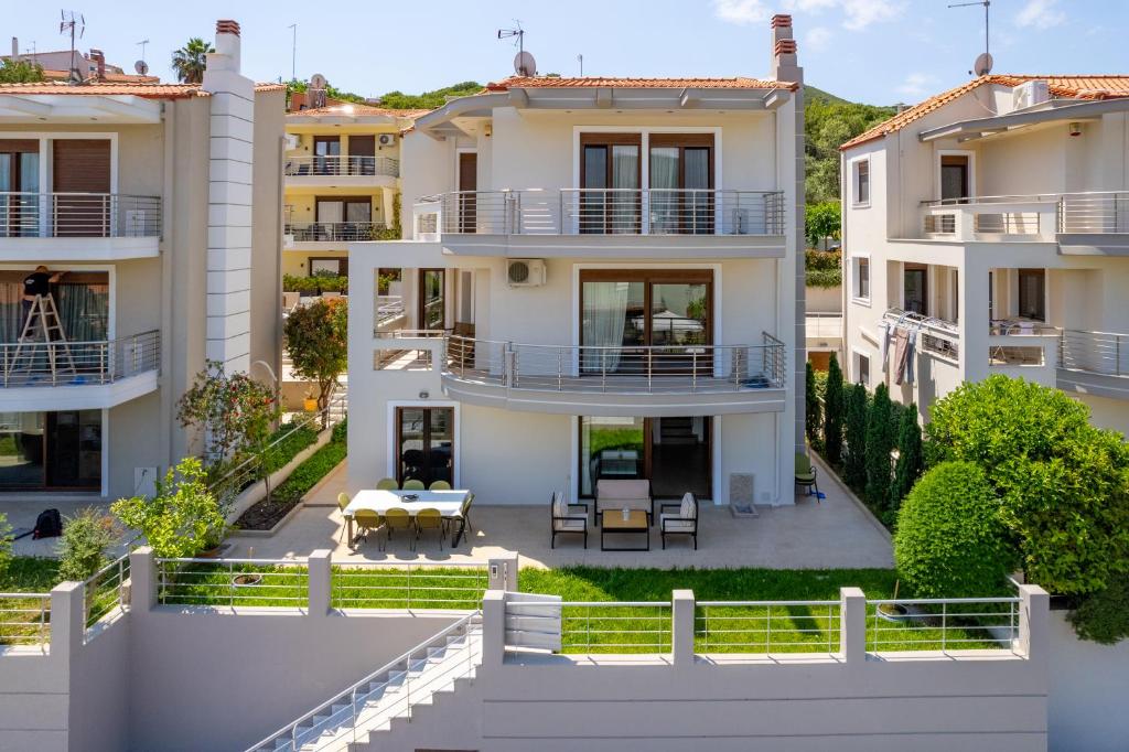 an aerial view of a villa with a yard at ALKIS LUXURY VILLA IRAKLiTSA in Kavala