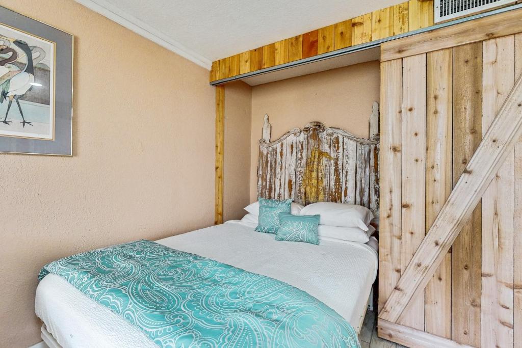Postel nebo postele na pokoji v ubytování Quaint Oasis