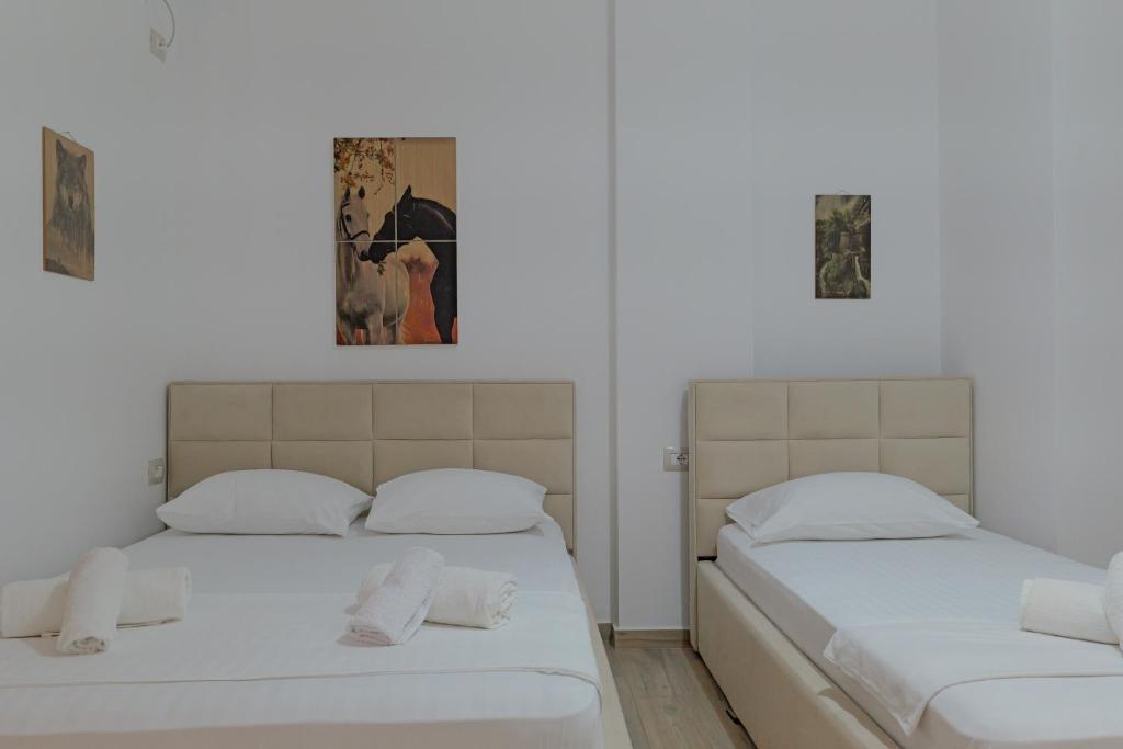 Postel nebo postele na pokoji v ubytování Hotel Veliaj