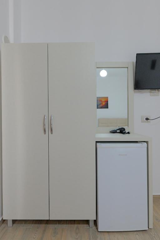 Kuchyň nebo kuchyňský kout v ubytování Hotel Veliaj