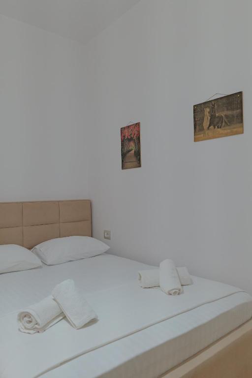 Postel nebo postele na pokoji v ubytování Hotel Veliaj