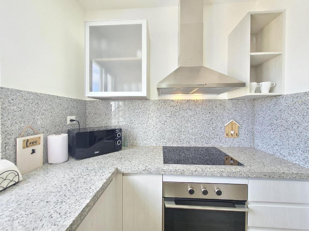 Kuchyň nebo kuchyňský kout v ubytování Beauty Apartment Coral Village 2 close to the beach