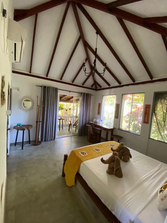 Postel nebo postele na pokoji v ubytování Villa Olde Ceylon