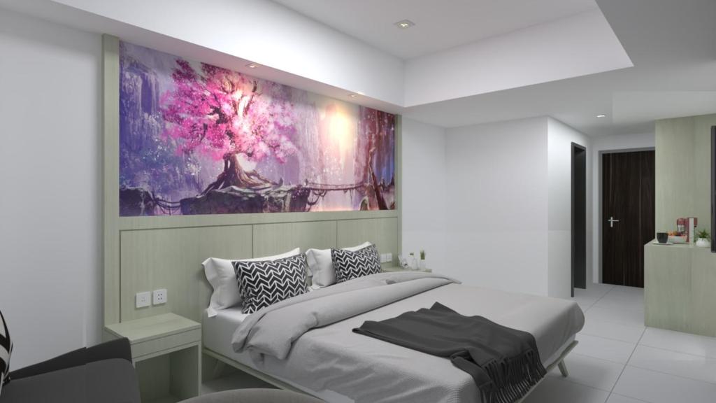 Postel nebo postele na pokoji v ubytování Nemuru Grand Suites