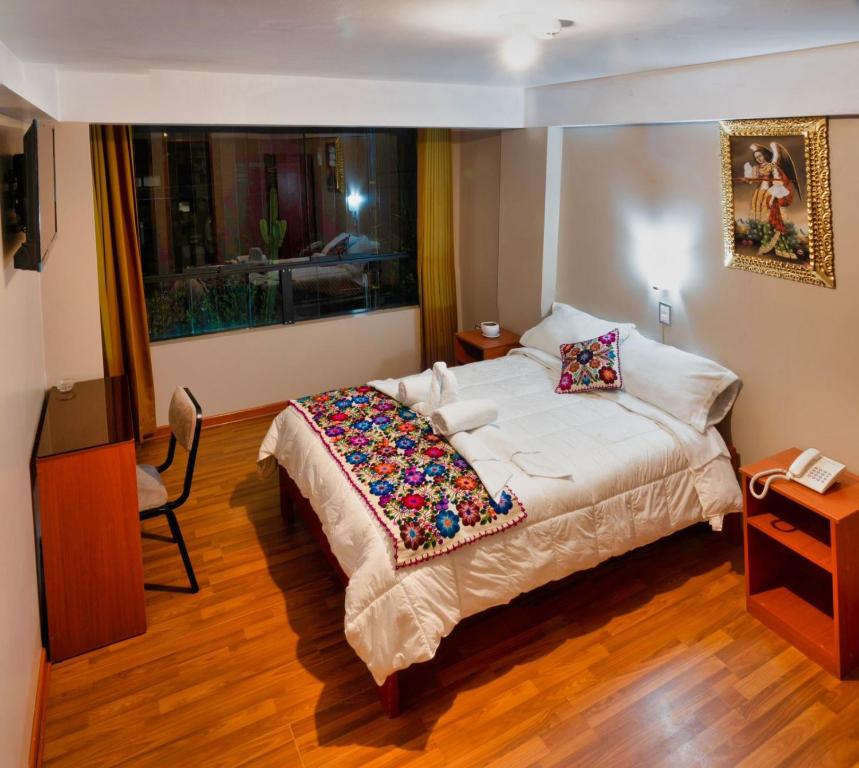 Katil atau katil-katil dalam bilik di Hotel Joram