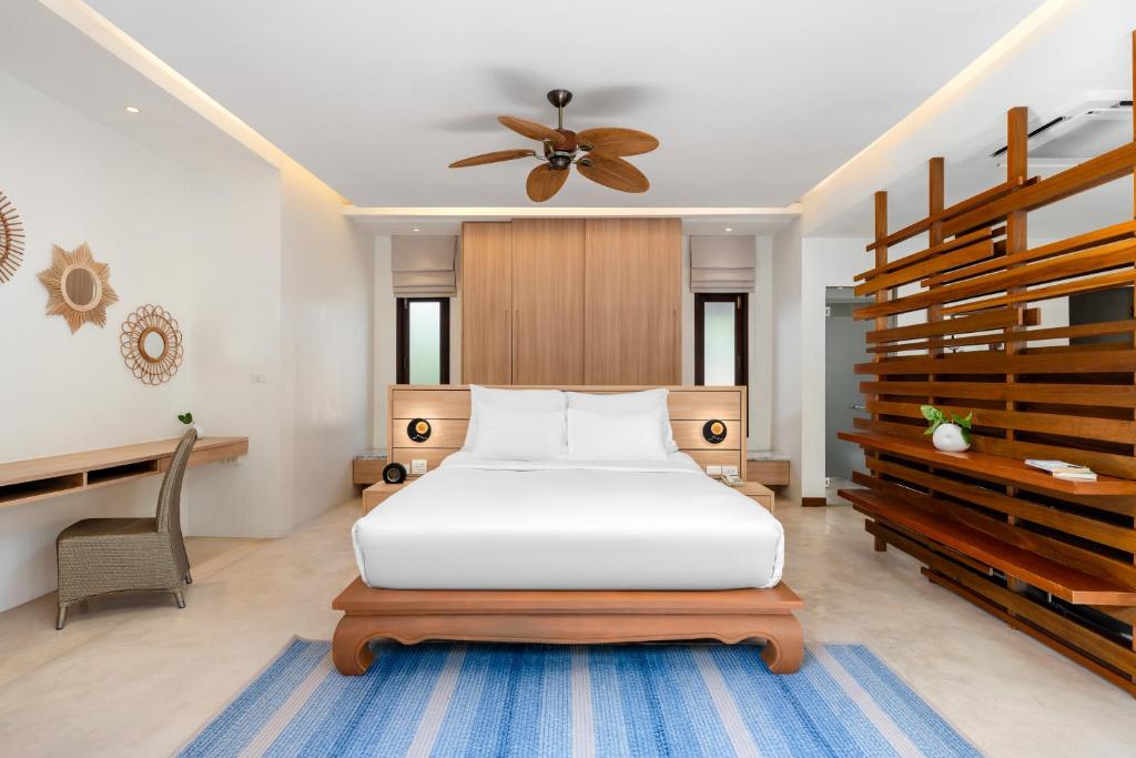 Postel nebo postele na pokoji v ubytování SAii Koh Samui Villas - Adult only 12 plus