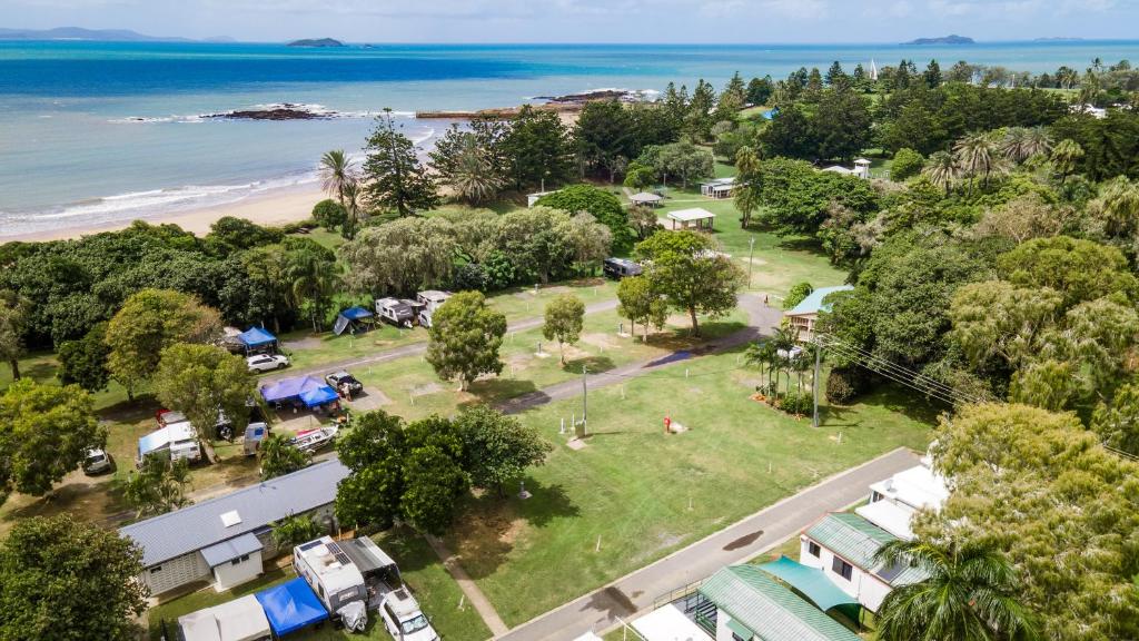 an aerial view of a camping site with the beach at Tasman Holiday Parks - Fisherman's Beach in Emu Park