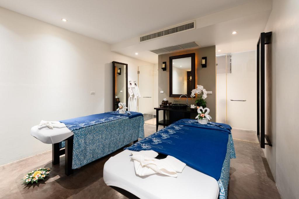 Postel nebo postele na pokoji v ubytování SAii Koh Samui Villas - Adult only 12 plus