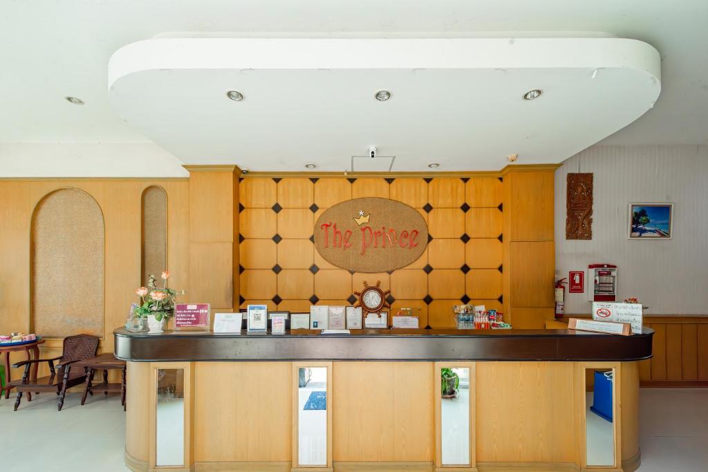 a restaurant with a counter with a sign that reads the mixer at The Prince Hotel in Phitsanulok