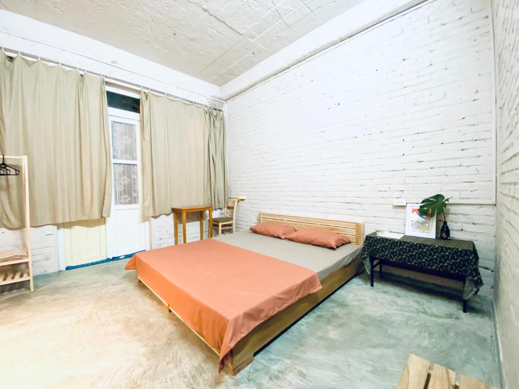 Postel nebo postele na pokoji v ubytování May's house (Nhà của Mây)