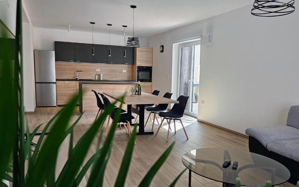 Kuchyň nebo kuchyňský kout v ubytování Apartment MoiRai