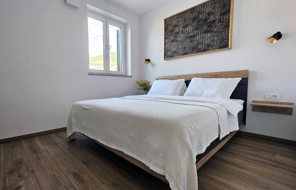 Postel nebo postele na pokoji v ubytování Apartment MoiRai