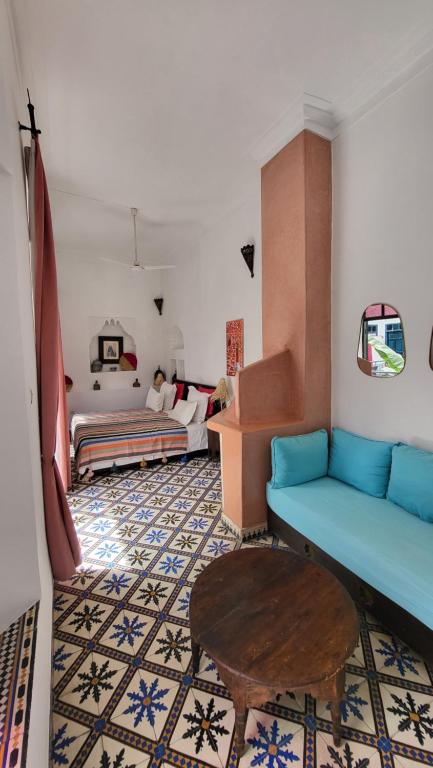 Postel nebo postele na pokoji v ubytování Riad Aloes & Spa