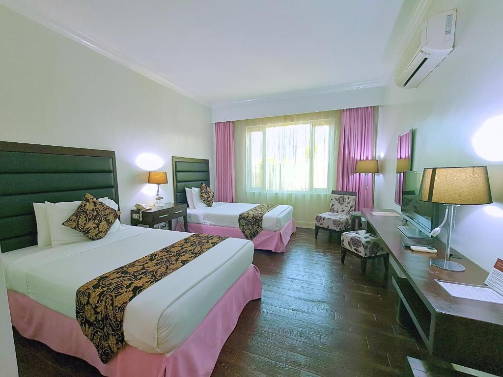Fiesta Garden Hotel by SMS Hospitality - Deluxe Room