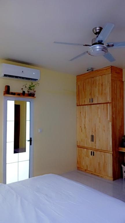 Postel nebo postele na pokoji v ubytování Island life Home Stay