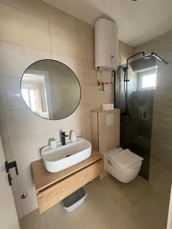 Koupelna v ubytování Apartmani Tomaš