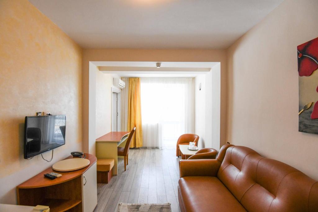TV a/nebo společenská místnost v ubytování Hotel Rio