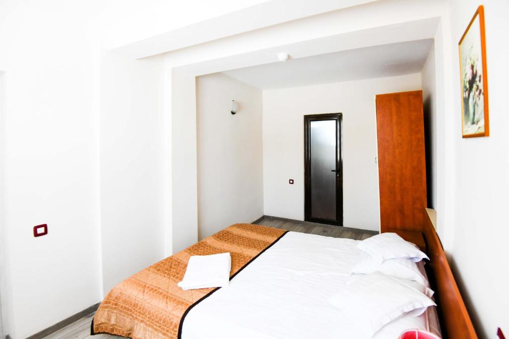 Postel nebo postele na pokoji v ubytování Hotel Rio