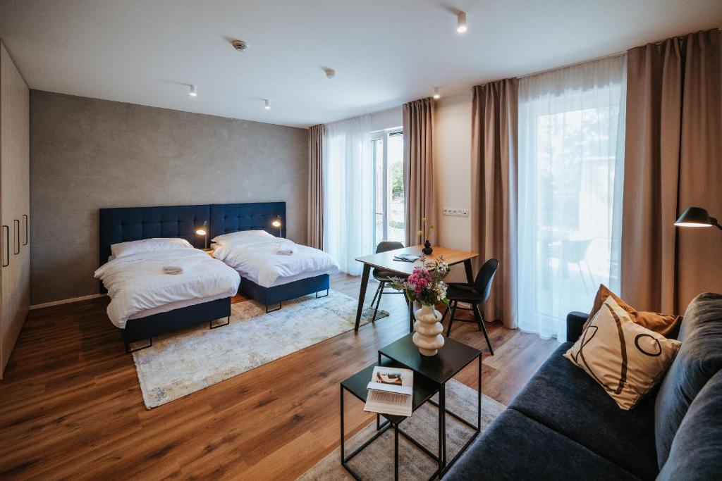 Postel nebo postele na pokoji v ubytování Apartmány Dog in Dock